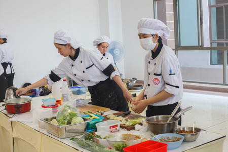 CHIANG-RAI THAILAND MAY 12: Cooking Competition. Students of the School of Tourism Management or Junior Iron Chef on May 12, 2016 at Mae Fah Luang University, Chiangrai Thailand.のeditorial素材