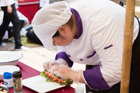 CHIANG-RAI THAILAND-MAY 15: Cooking Competition Students of the School of Tourism Management (Junior Iron Chef) on May 15, 2015 Mae Fah Luang University, Chiang-rai Thailand.のeditorial素材