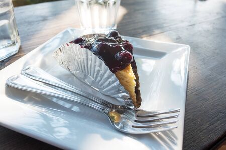 Blueberry cheesecake on the coffee shopの写真素材