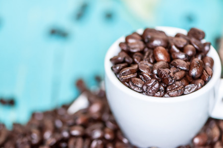 coffee beans in a coffee cup