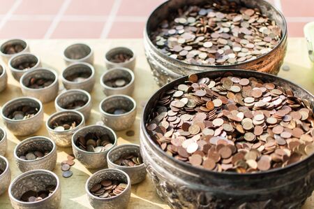 pile of thaicoin background in thai temple