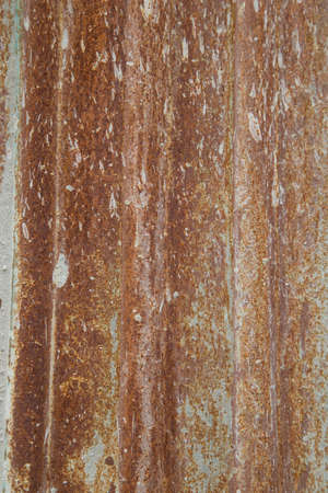 Macro photo of textures in metal, rust and paint, suitable for backgrounds and layers