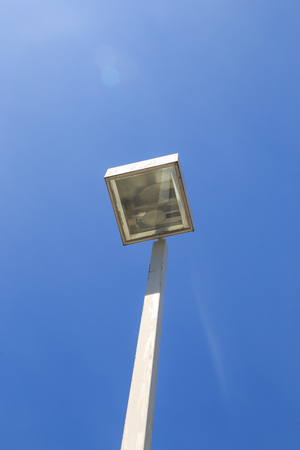 Street lamp and blue sky in the backgroundの写真素材