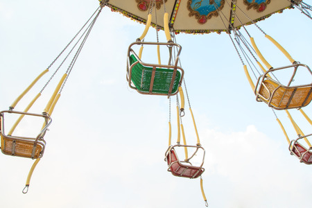chain swing ride in amusement parkの写真素材