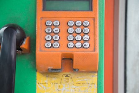 An image of color full public telephone