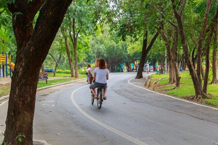 cycling in the parkの写真素材