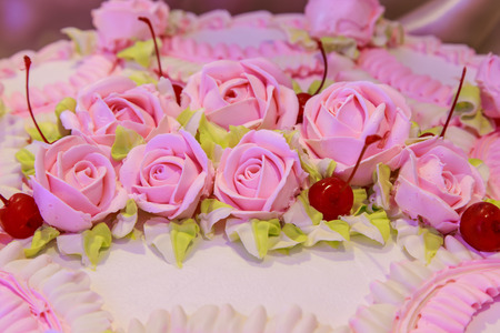 wedding cake beautiful decorated with rosesの写真素材