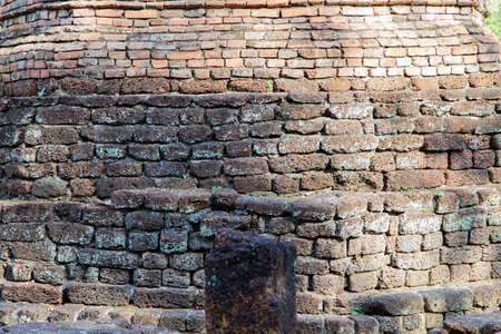 old laterite wall background, rough and grain surfaceの写真素材