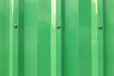 Faded green metal wallの写真素材