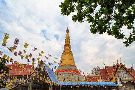 Gold pagoda and blue sky background.,Wat Chumphon Khiri temple, Mae Sot, Tak province, Thailandのeditorial素材