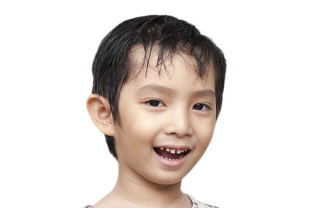 Asian boy smiling on isolate の写真素材