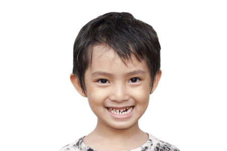 Asian boy smiling on isolate の写真素材