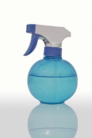 The blue spray bottle の写真素材