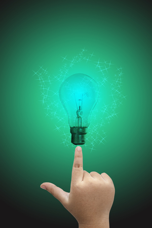 Light bulb in children hand の写真素材