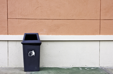 trash and wall の写真素材