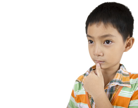 Asian Boy thinking isolated の写真素材