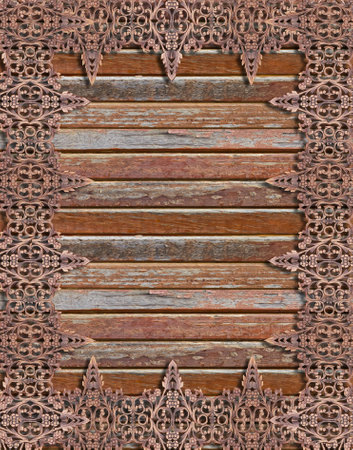 Pattern of flower carved on wood background の写真素材