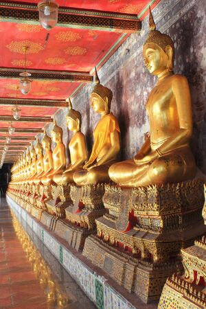 meditation buddha statues in wat suthat, bangkok, thailandのeditorial素材