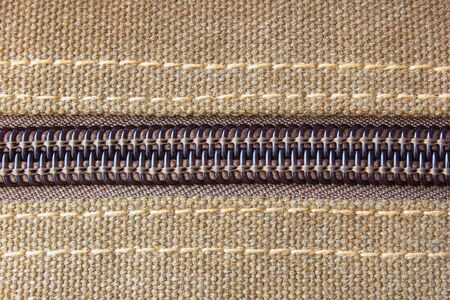 closeup background of brown haversack zipper