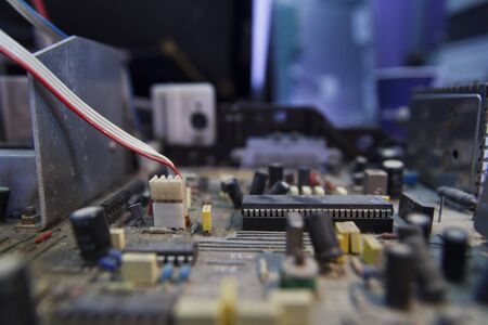 Inside old dusty electronics with chip IC and other parts