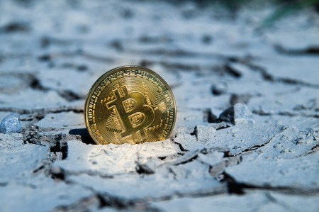 BITCOIN BTC crypto currency hitting bottom dry supportの写真素材