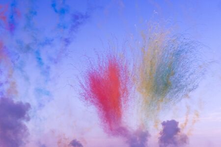 Day fireworks made with color bombs exploding smoke paintの写真素材