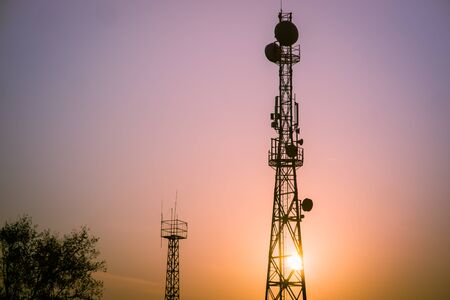 5G radio transmitting tower with antennas for communication coverageの写真素材