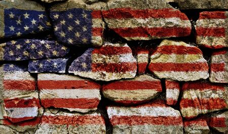 The American Flag painted on to a stone wall.の写真素材