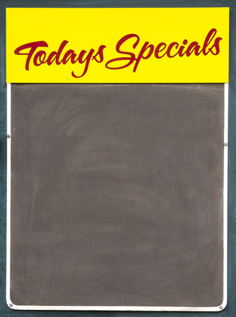 Well used black chalkbaord advertising Todays Specialsの写真素材
