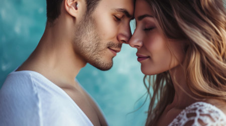 couple sharing a romantic moment, in front of a dreamy pastel blue studio background generative aiの素材