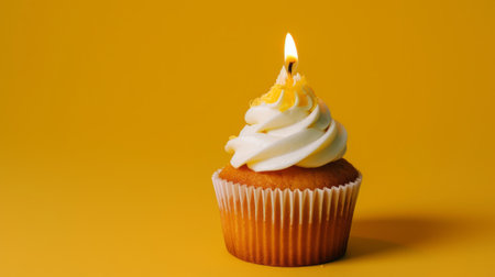 Delicious cupcake with lemon-flavored frosting and a single candle, generative aiの素材