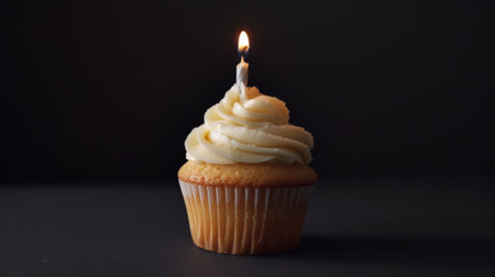 Elegant studio capture of a vanilla cupcake with luscious white frosting and a single candle generative aiの素材