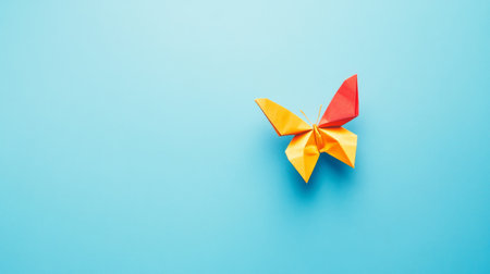 Colorful origami butterfly flying on a blue background generative aiの素材
