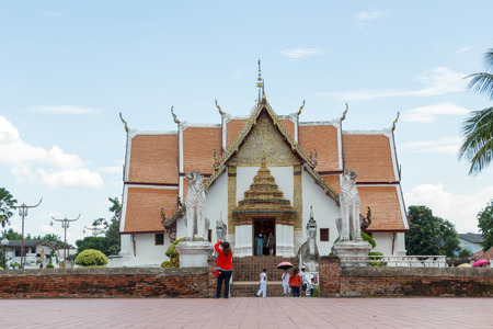Nan, Thailand - September 20, 2015: Many tourist visiting Wat Phumin for pay respect to Buddha and take a photo.のeditorial素材