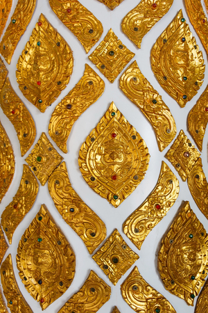 Golden garuda pattern, Thai pattern in Buddhist temple.の写真素材