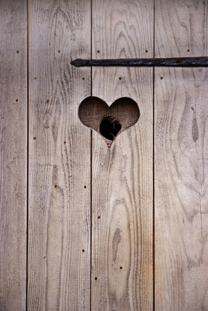 Heart in wooden doorのeditorial素材