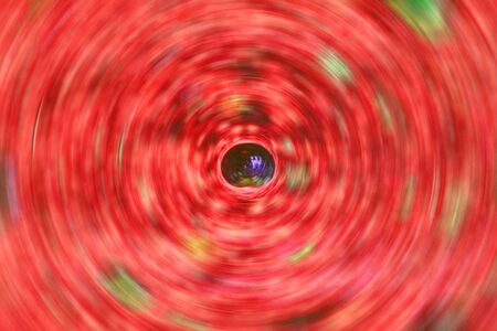 bstract Background Of Spin Circle Radial Motion Blur is color redの写真素材