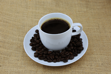 hot coffee in cup coffee on the hemp sackの写真素材