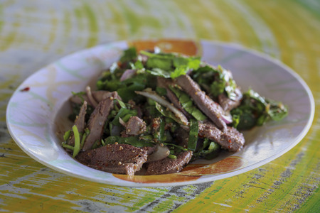 Spicy pig liver with vegetable, Thai foodの写真素材