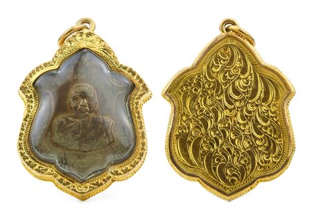 front and back of small buddha image used as amulets on white backgroundの写真素材
