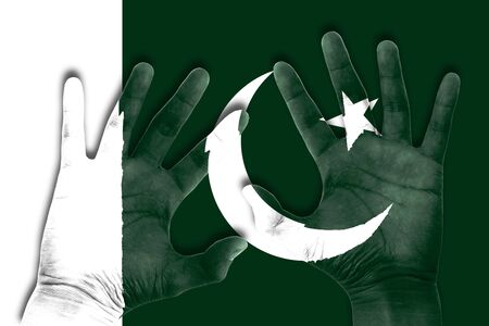 hands on pakistan flag backgroundの写真素材