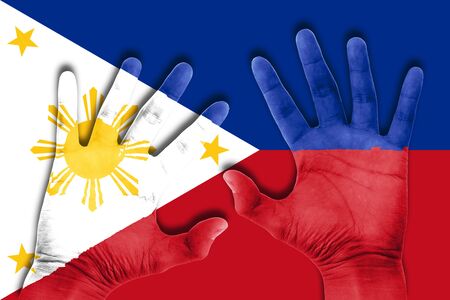 hands on philippines flag backgroundの写真素材