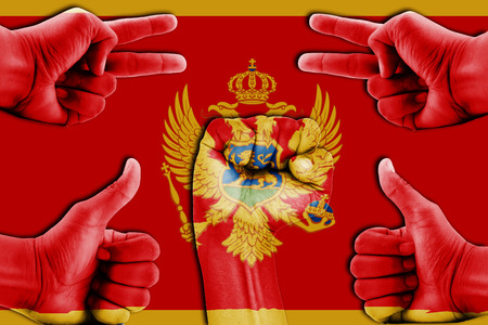 hands on montenegro flag backgroundの写真素材
