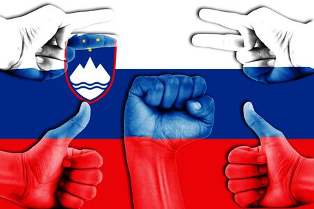 hands on Slovenia flag backgroundの写真素材
