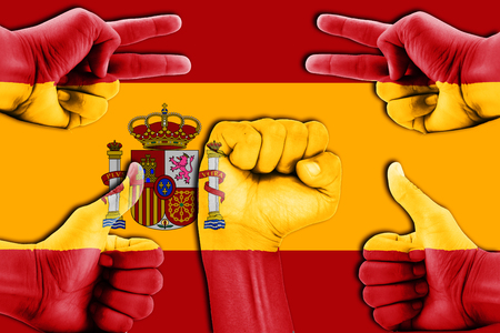 hands on Spain flag backgroundの写真素材