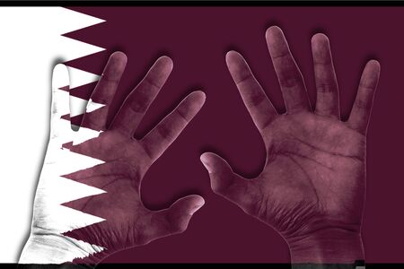 hands on qatar flag backgroundの写真素材