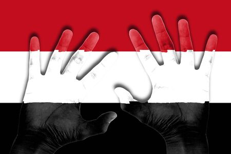 hands on yemen flag backgroundの写真素材