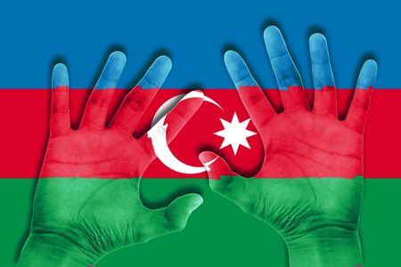 hands on azerbaijan flag backgroundの写真素材