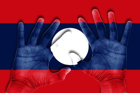 hands on laos flag backgroundの写真素材