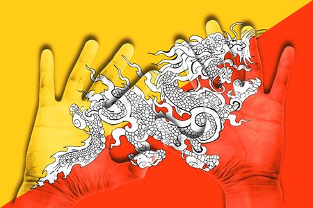 hands on bhutan flag backgroundの写真素材